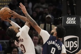 Darius Garland (Cleveland/à gauche) a brillé vendredi face à Washington KEYSTONE/AP/Sue Ogrocki